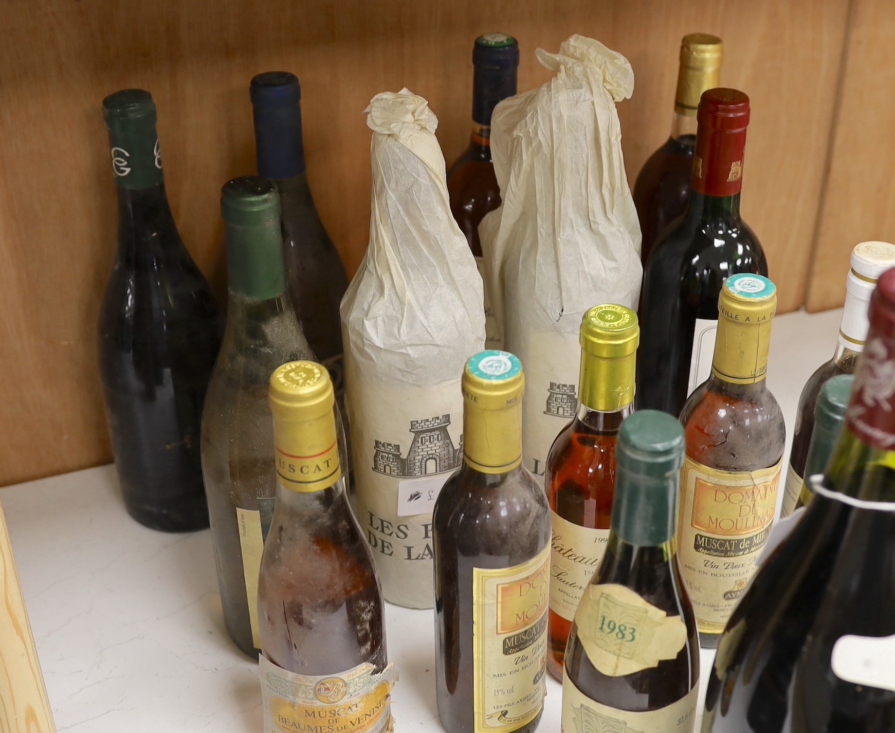 Sixteen bottles of mixed wines, including two bottles of Les Forts de Latour